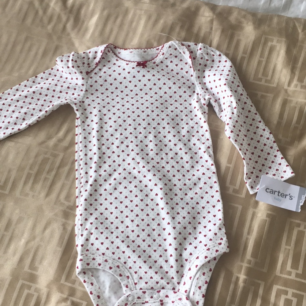 Baby girl onesie with hearts